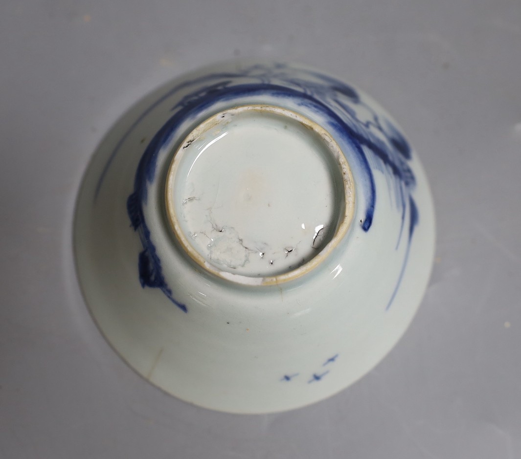 A Chinese clobbered dish with bronze mount, a Chinese blue-and-white Buddhist lion dish and a blue and white landscape bowl, 18th century and later